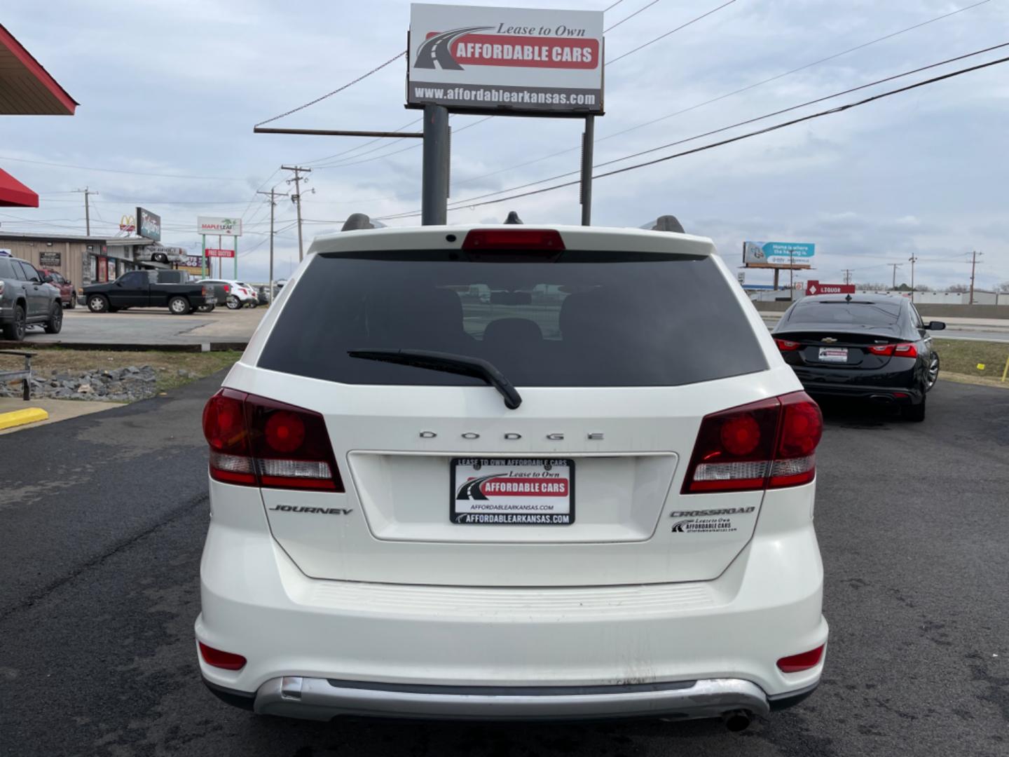 2016 White Dodge Journey (3C4PDCGB8GT) with an 4-Cyl, 2.4 Liter engine, Auto, 6-Spd AutoStick transmission, located at 8008 Warden Rd, Sherwood, AR, 72120, (501) 801-6100, 34.830078, -92.186684 - Photo#6